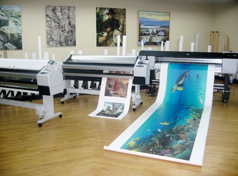 Giclée printing replicates the color, depth and texture of original works art by using sophisticated image-capture technology and wide-format inkjet printers that use six or more colors of pigment inks with the highest quality artist papers or canvases. Modern wide-format inkjet printers, such as the 64-in. Epson Stylus Pro 11800 and GS6000 printers used in Lizza Fine Art Studios, spray millions of droplets of ink per second onto canvases or art papers that have been pretreated to receive the ink. The spray of ink is so fine that the droplets cannot be seen by the naked eye. It takes a 10X or 15X loupe to see the black dots, which are the largest dots on the canvas or paper. A finished image is made up of close to 20 billion dots of ink, which are applied in continuous tone or stochastic screening patterns that can make it difficult to distinguish the final print from the original.   